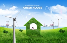 草地上的绿色房屋和风车
